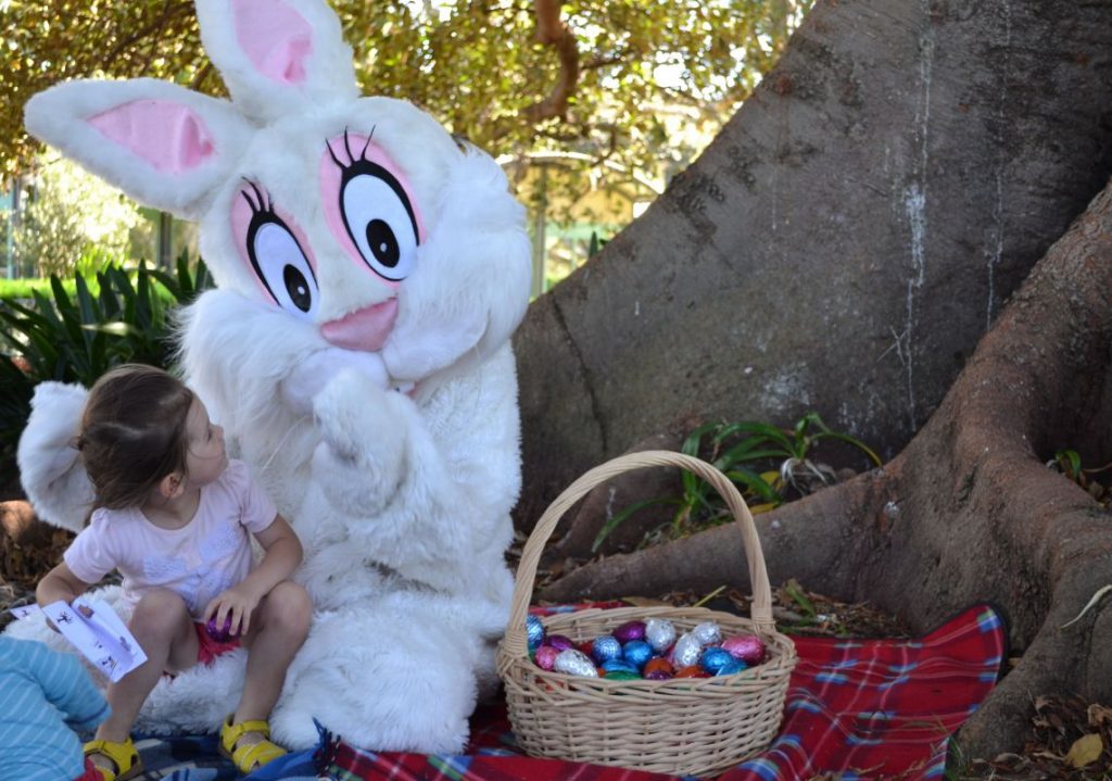 Child with easter bunny at Centennial Parklands