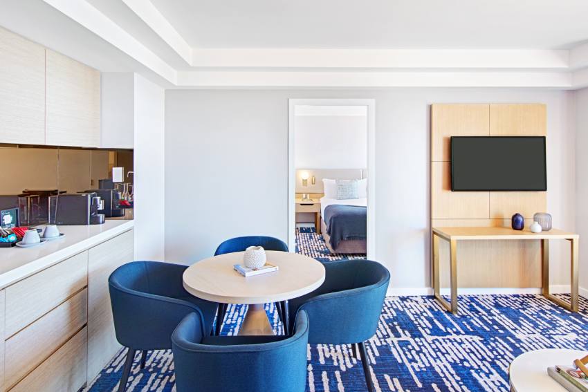 Seaside Suite lounge flow through from guestroom at Crowne Plaza Coogee